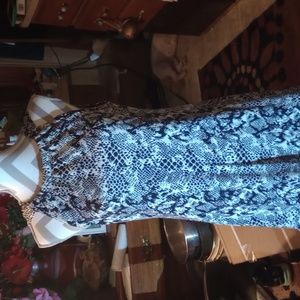 Sleek sexy dress like new...very cool an cute...